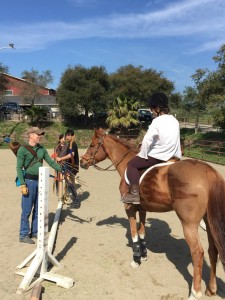 Cherie Pfaff chatting about horse archery, with Lefty from the "California Centaurs"