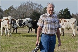 image of Charlie photographing longhorn cattle